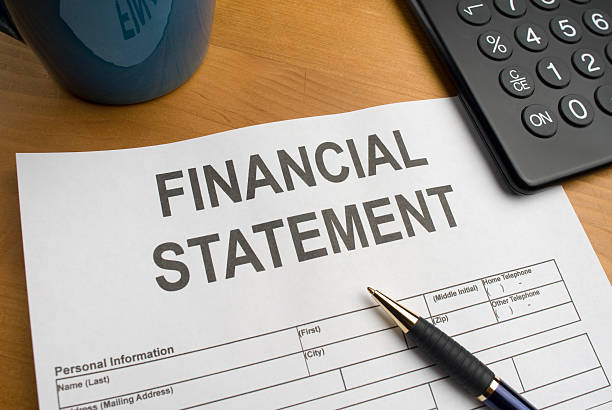 blank financial statement form on a desktop