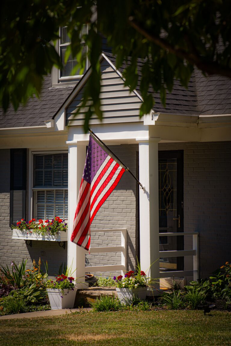 VA home in Franklin TN with American flag representing VA home loan benefits for Veterans